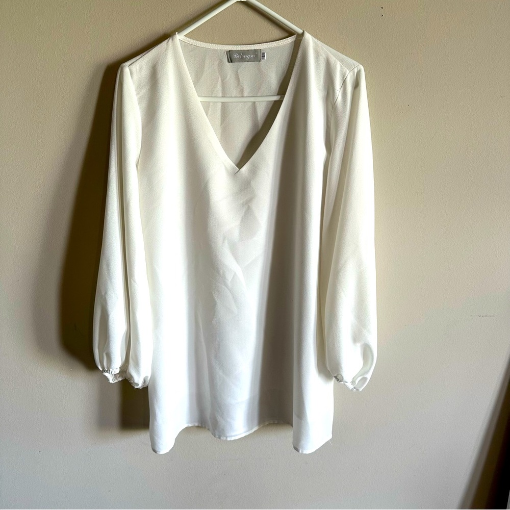 White long sleeve v neck shirt